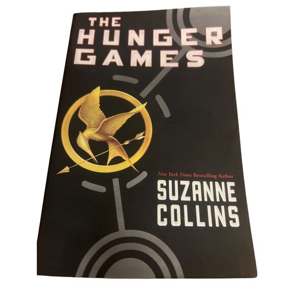 The Hunger Games By Suzanne Collins Paperback Book One Novel Made Movie - Picture 1 of 3
